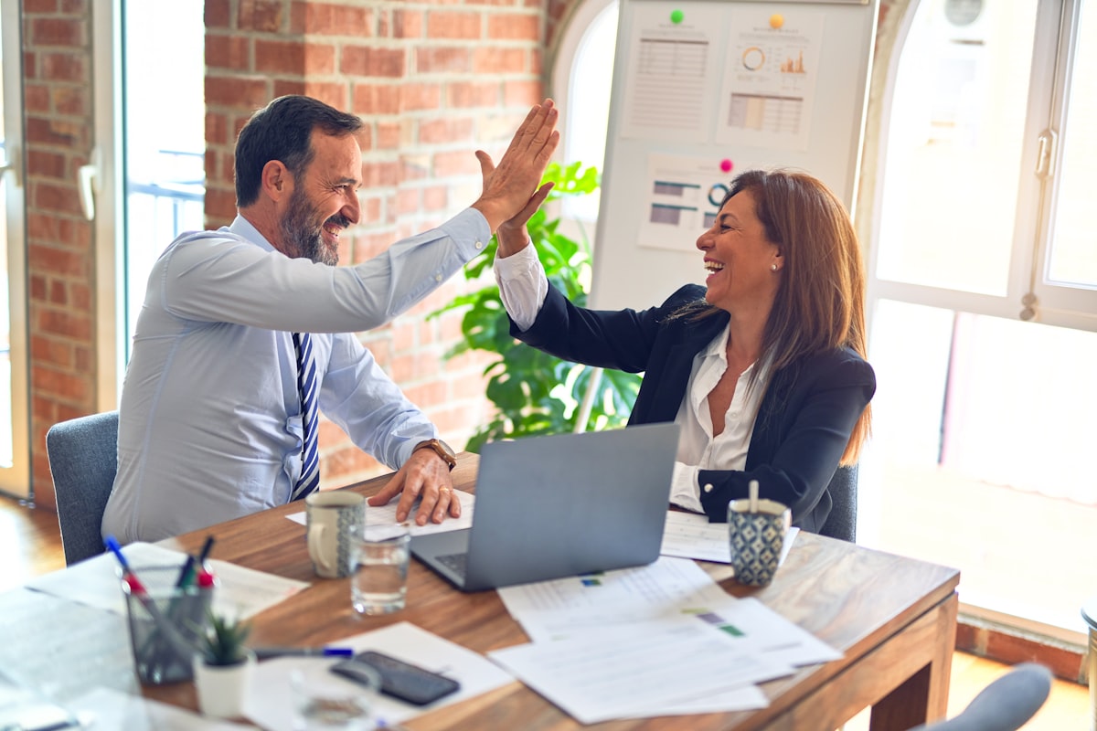 Recruiter reviewing candidate screens at a desk